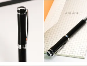 Close-up and lifestyle view of a minimalist black and silver metal rollerball pen