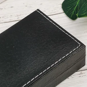 Élégante boîte-cadeau en cuir PU noir avec surpiqûres blanches pour stylos et bijoux