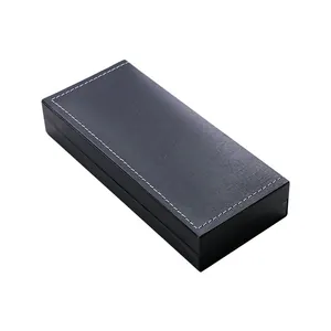 Élégante boîte cadeau rectangulaire noire avec coutures blanches pour stylos et bijoux
