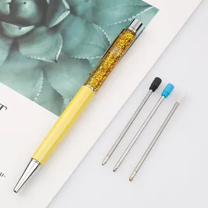 Elegant yellow crystal ballpoint pen with gold glitter and three metal ink refills set
