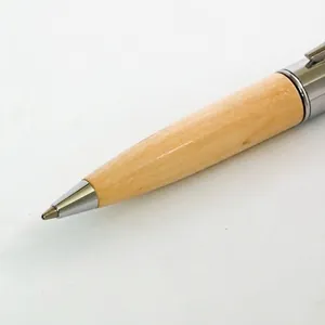 Short maple wood ballpoint pen with polished silver metal tip for smooth writing