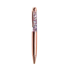 Elegant rose gold metal ballpoint pen featuring decorative colorful sequin and glitter fill.
