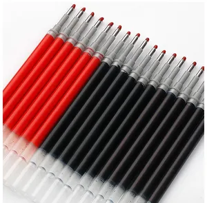 Macro detail of high-quality black and red rollerball pen refills with protective wax tips.
