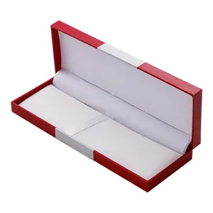 Elegant red rectangular flip gift box with white interior for pens and jewelry.