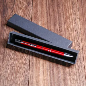 Elegant red ballpoint pen with silver accents in a premium black cardboard gift box