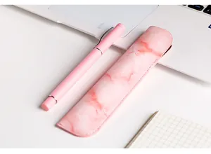 Close-up detail of pink pen and marble pattern PU leather protective sleeve set