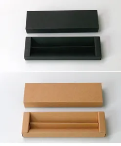 Détail des boîtes à stylos de style tiroir en carton noir et marron kraft