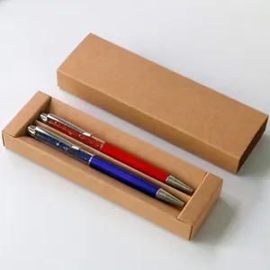 Boîte cadeau élégante en papier kraft avec deux stylos à bille à sommet en cristal