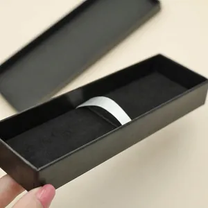 Premium black rectangular cardboard pen gift box with internal white securing ribbon