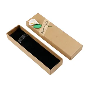 Vintage kraft paper gift box with black velvet lining and decorative calla lily flower