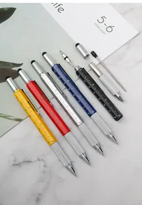Detailed view of multifunctional metal tool pens with various integrated tool attachments