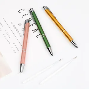 Premium metal retractable ballpoint pens with refills in rose gold, green and gold colors.