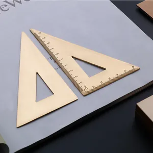 Vintage brass triangle ruler set with laser engraved metric scales for drafting use