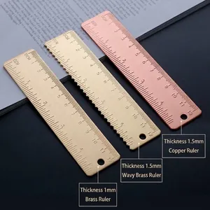 Set of 12cm vintage brass and copper rulers with wave and straight edges