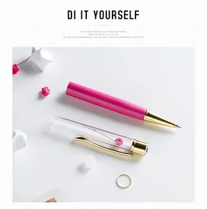 Detail view of pink and gold DIY empty barrel ballpoint pen for creative filling