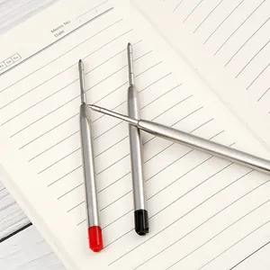 Premium 99mm G2 metal ballpoint pen refills set on a minimalist paper notebook