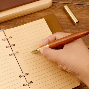 Elegant vintage sandalwood fountain pen with brass details for premium business writing