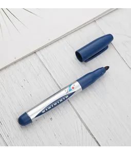 Detail view of the durable fiber nib and sleek metallic barrel of a blue marker
