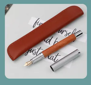 Classic Dalbergia wood fountain pen with matching brown leather sleeve and iridium nib