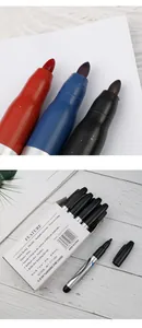 Detailed view of red, blue, and black marker tips and professional oil-based marker box