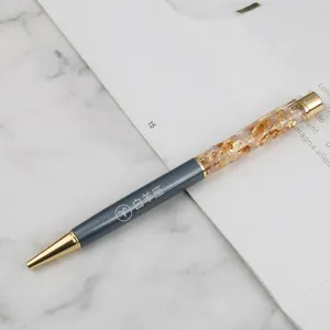 Elegant gold foil crystal ballpoint pen with blue metal barrel and Aries engraving