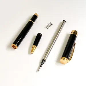 Professional disassembled metal rollerball pen with elegant gold accents on white