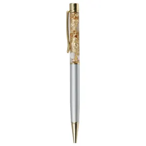 Elegant gold foil crystal ballpoint pen with metallic silver barrel and gold accents