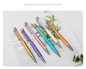 Elegant set of six metallic ballpoint pens with sparkling crystal-filled upper barrels