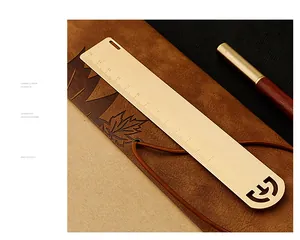Detailed view of a retro thickened brass ruler and bookmark with 15cm scale.