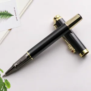 Elegant black and gold metal business rollerball pen with a decorative dragon clip