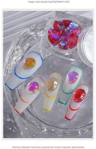 Macro detail of aurora candy ice cube nail drills with iridescent irregular flat back gemstones