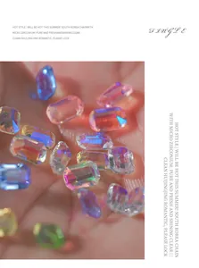 Close-up of vibrant aurora ice sugar rhinestones for manicure nail art decoration.