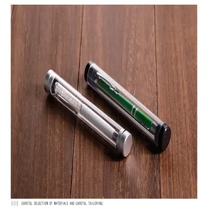 Close-up view of two transparent cylindrical PP plastic storage tubes for tools