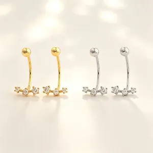 Pendientes de plata s925 curvados con circonitas en acabados dorado y plateado