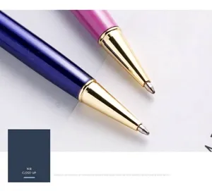 Macro close-up of durable metal ballpoint pen nib showing sturdy bullet-head design.