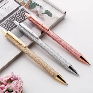 Elegant retractable glitter ballpoint pens in rose gold, silver, and gold metallic finishes