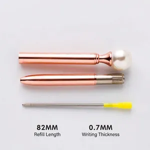 Elegant rose gold metal ballpoint pen featuring a large white pearl and 0.7mm refill