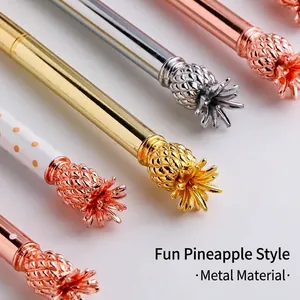 Elegant metallic ballpoint pens featuring decorative pineapple toppers in assorted finishes