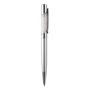 Stylo bille élégant en métal argenté avec une section transparente remplie de cristaux décoratifs
