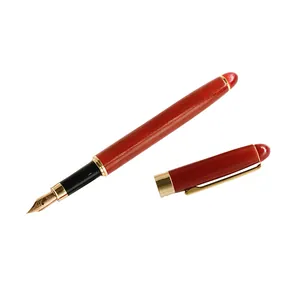 Elegant redwood fountain pen with gold metal accents for business gift