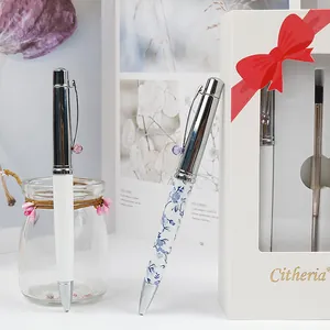 Elegant floral and white metal ballpoint pen gift set with a white bow decorative box
