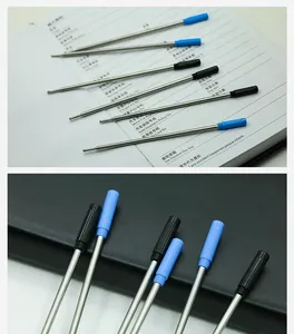 Detailed close-up showing metal ballpoint pen refills in black and blue ink colors