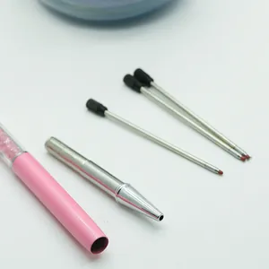 High-quality detail view of 7cm metallic ballpoint pen refills and silver tip components.