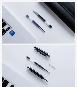Detailed view of disassembled black rollerball pen with blue and black ink refills