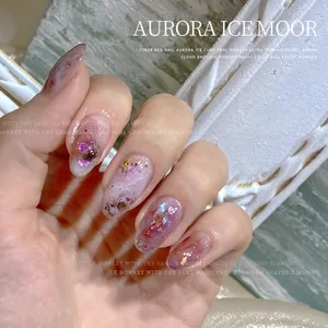 Iridescent Aurora opal nail powder with a polarized cloud brocade gradient finish