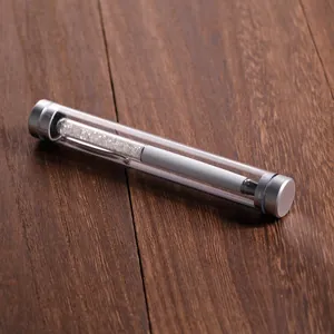 Premium cylindrical transparent organizer tube with silver caps on dark wood surface