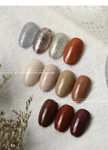 Various autumn and winter gel nail polish colors with glossy and glitter finishes on tips