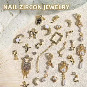 French Luxury Gold Alloy Nail Art Decoration Rhinestone Artificial Pearl Bow Star Tassel Chain Nail Charms DIY Manicure Accessories