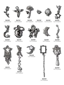 Elegant silver nail art charms collection featuring pearls, bows, stars, moons, and tassels