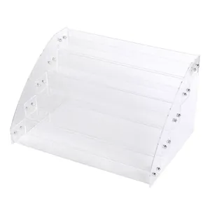 Clear 5-tier acrylic nail polish display rack and cosmetic storage organizer.